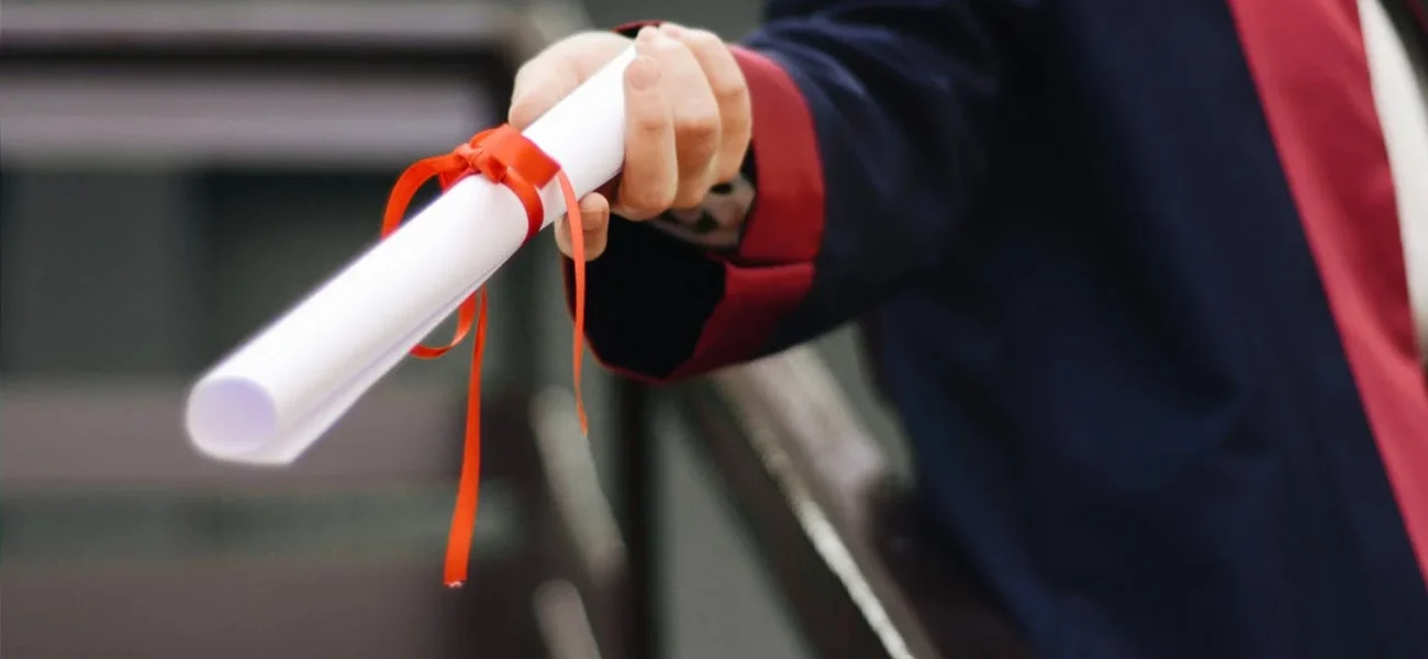 Person Holding White Scroll